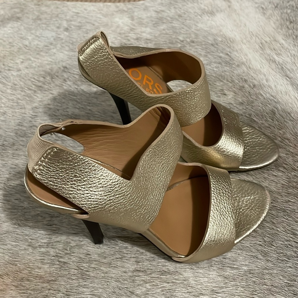 Michael Kors, Royal Sandal - Gold
Heel: 4.5 inches 
Material: Leather